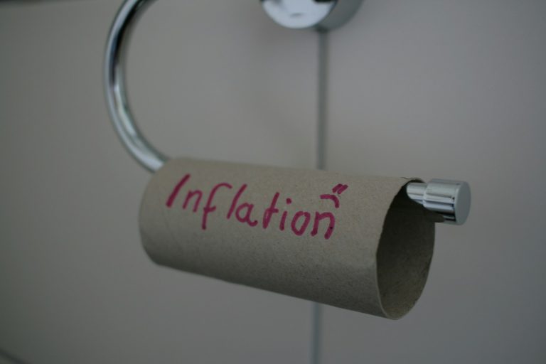 a roll of toilet paper - A retiree reviewing pension strategies to protect their income from inflation, focusing on financial stability