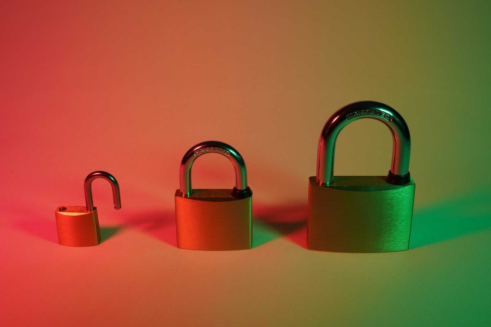 two pink padlock on pink surface - A retiree reviewing how the Triple Lock system affects State Pension increases and financial planning